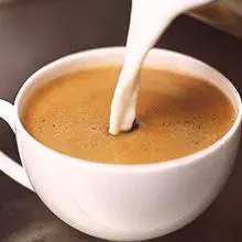 Kava z mlekom: koristi in škoda
